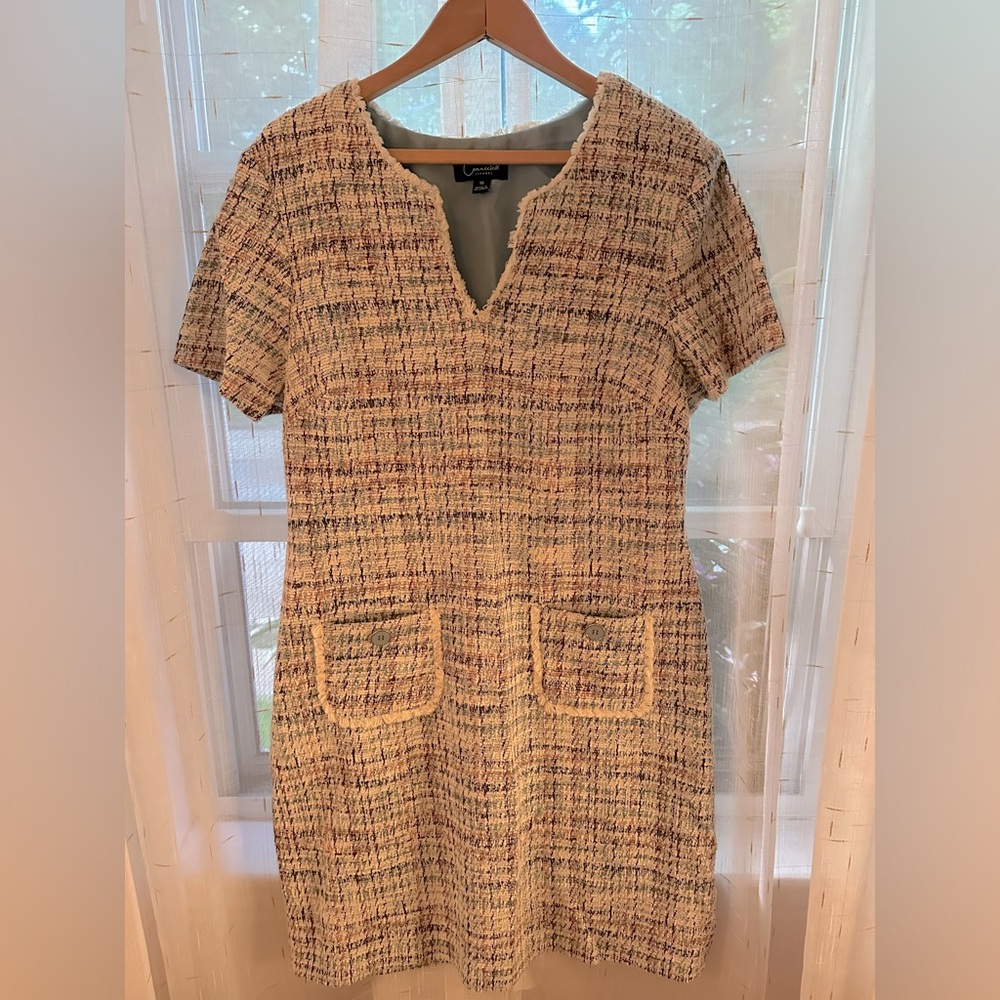 Tweed style work dress with pockets.